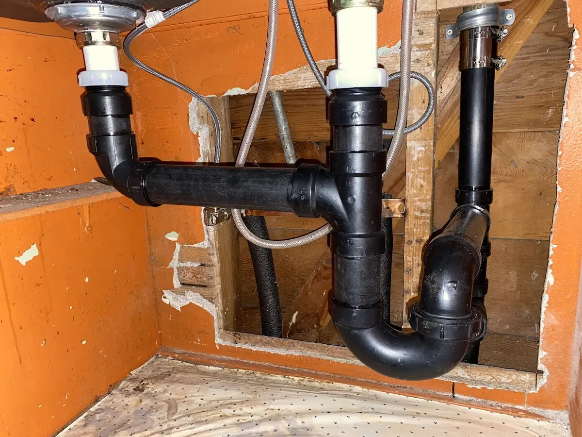 Professional Garbage Disposal Repair equipment and tools on the job in East Donegal
